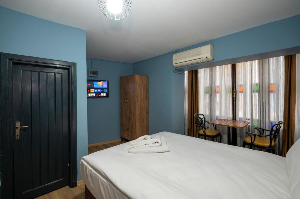 Taksim Antique Hotel客房内的一张或多张床位