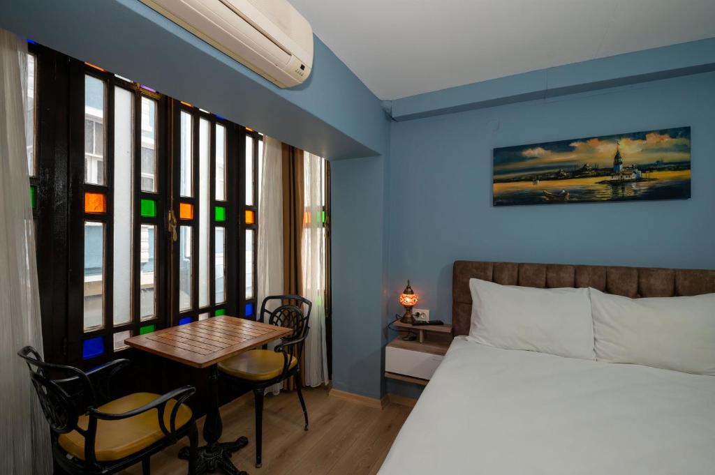 Taksim Antique Hotel客房内的一张或多张床位