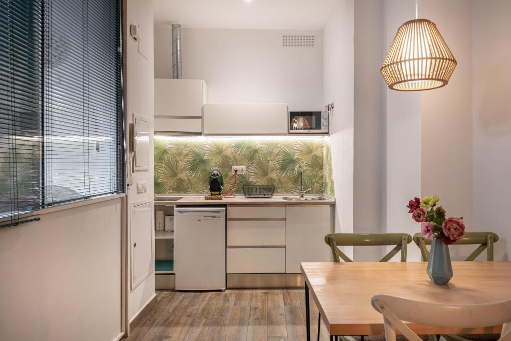 Kuchyň nebo kuchyňský kout v ubytování Apartamentos Boutique Granada Albaicín 3000