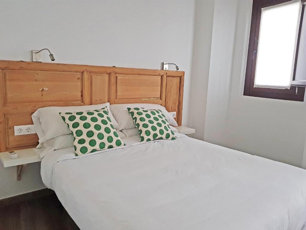 Postel nebo postele na pokoji v ubytování Apartamentos Boutique Granada Albaicín 3000