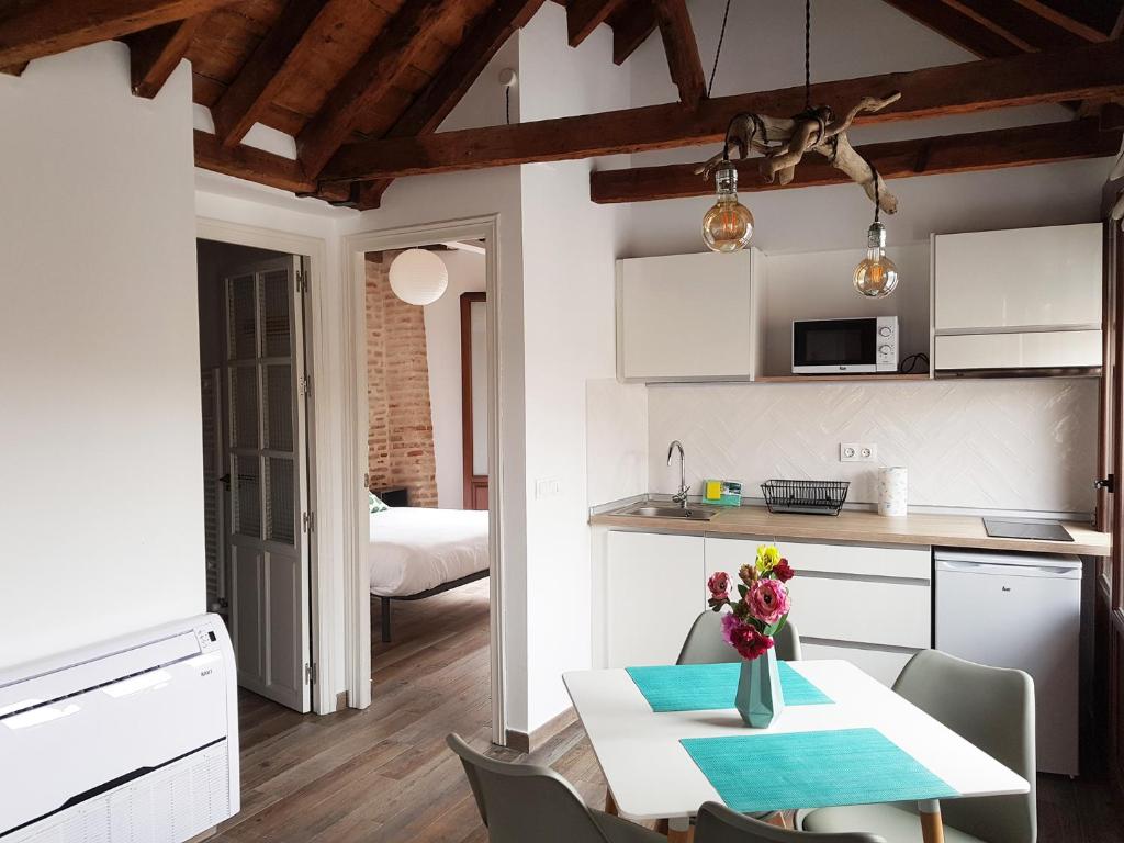 Postel nebo postele na pokoji v ubytování Apartamentos Boutique Granada Albaicín 3000
