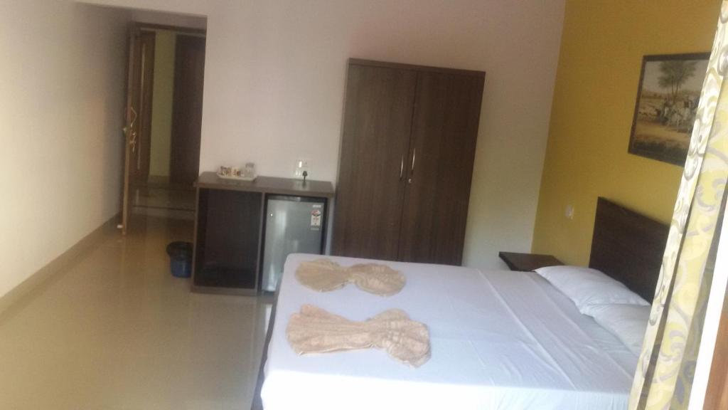 Postel nebo postele na pokoji v ubytování Darolina Guest House