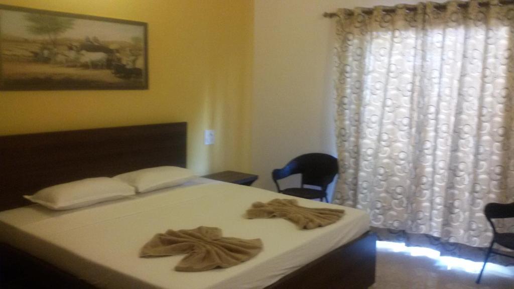 Postel nebo postele na pokoji v ubytování Darolina Guest House