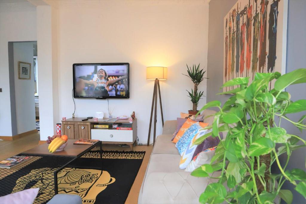 A television and/or entertainment centre at Taksim Roya Apartment -center of the Istanbul