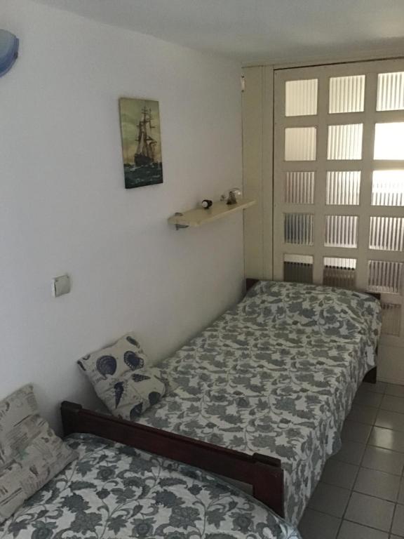 Postel nebo postele na pokoji v ubytování Apartments Subotic