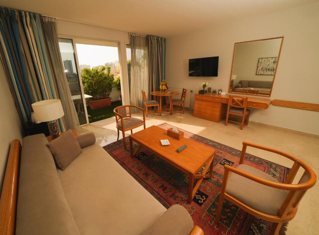 TV a/nebo společenská místnost v ubytování Casa D'or Hotel