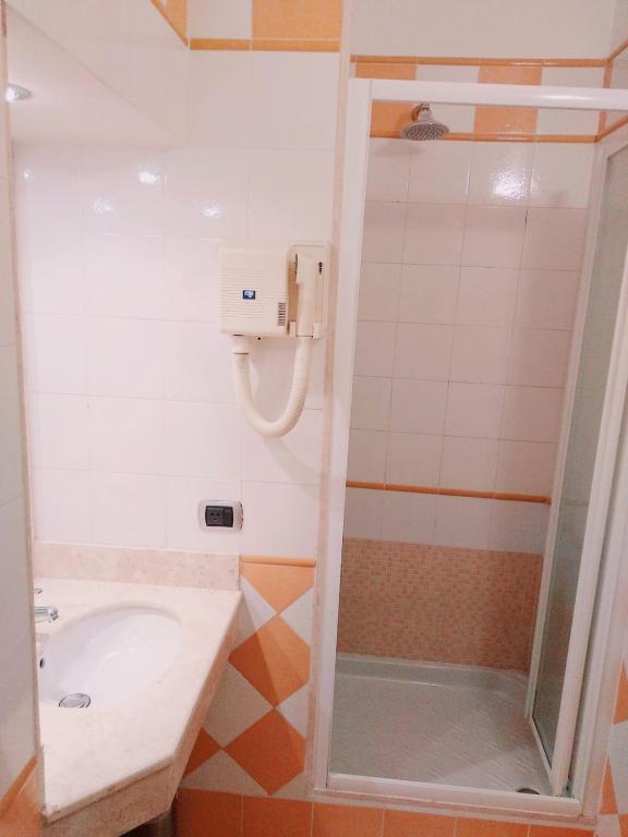 Koupelna v ubytování Hotel Fenicia