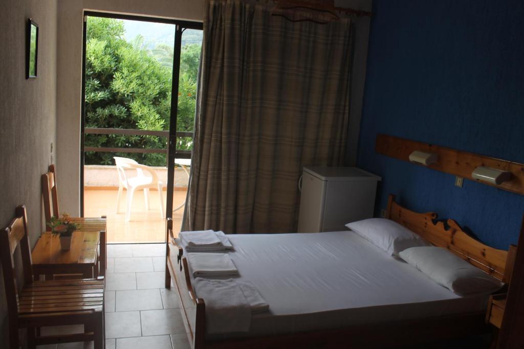 Postel nebo postele na pokoji v ubytování Le Mirage Hotel