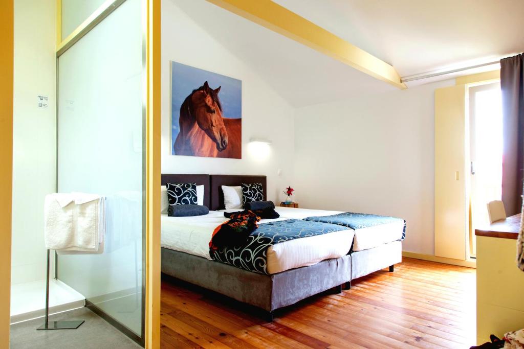 Postel nebo postele na pokoji v ubytování Pátio Ecolodge