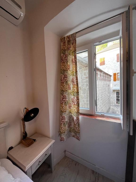 Posteľ alebo postele v izbe v ubytovaní Athos Guesthouse