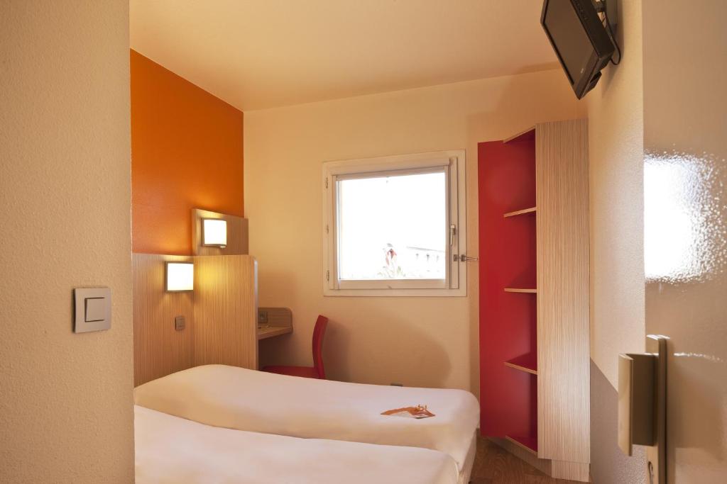 Cama o camas de una habitación en Première Classe Perpignan Nord - Aéroport