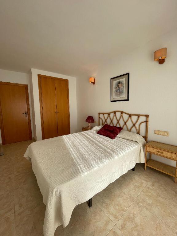 Postel nebo postele na pokoji v ubytování Alpen1 Mediterráneo