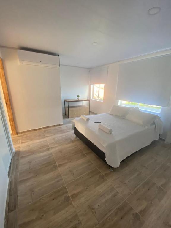 Postel nebo postele na pokoji v ubytování Apartamentos GreenUP