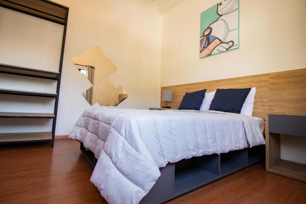Postel nebo postele na pokoji v ubytování Hostal 170