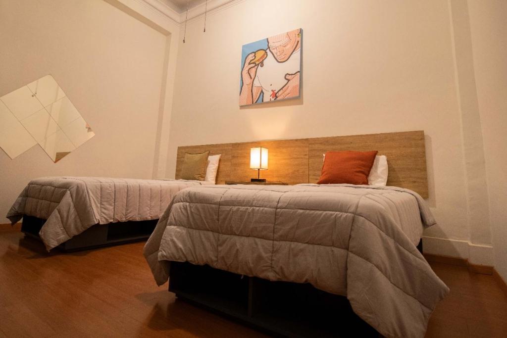 Postel nebo postele na pokoji v ubytování Hostal 170
