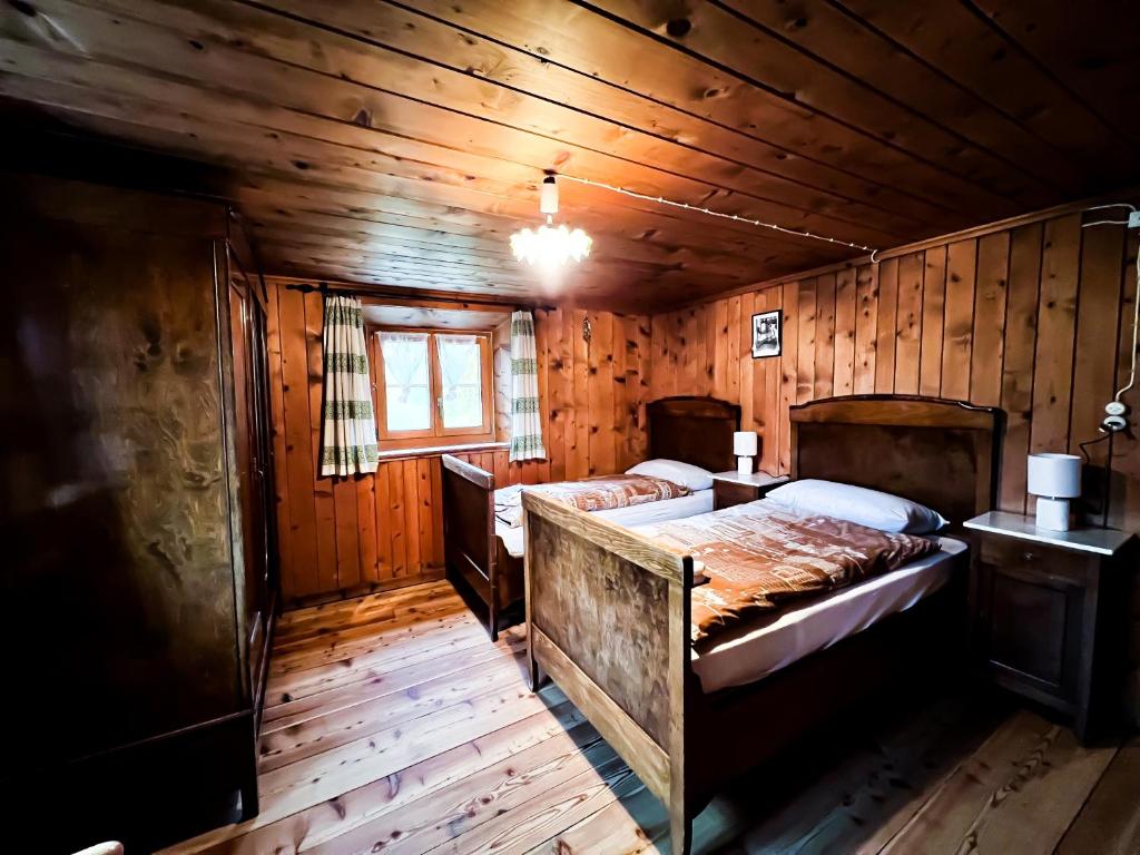Postel nebo postele na pokoji v ubytování Albergo Ristorante Selva