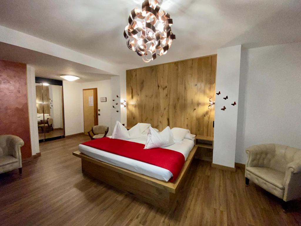 Postel nebo postele na pokoji v ubytování Hotel Casagrande