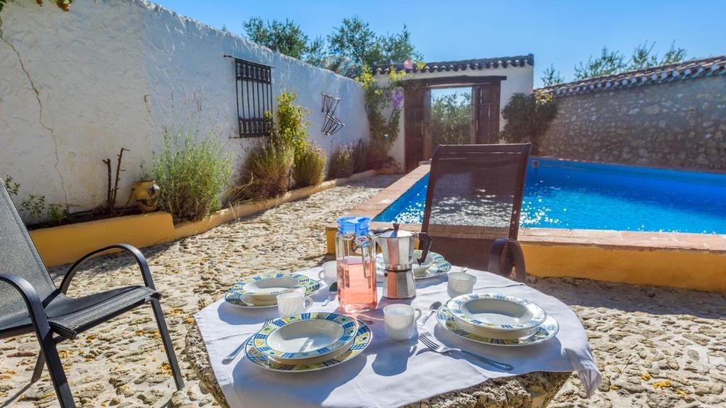 The swimming pool at or close to Casa Molino Algarinejo by Ruralidays