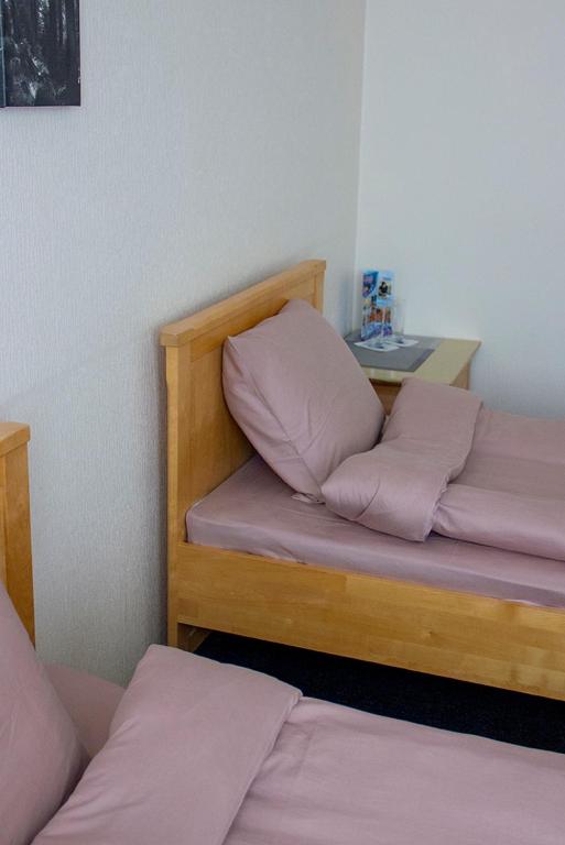 Postel nebo postele na pokoji v ubytování Olimpija Hotel & SPA