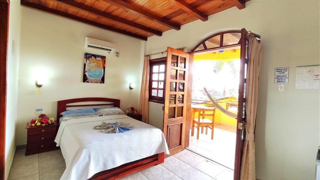 Postel nebo postele na pokoji v ubytování Hotel Cielo Azul