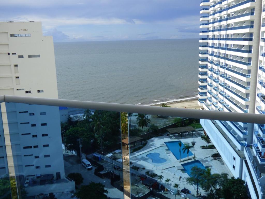 a view of the ocean from a balcony at Apartamento Reserva Del Mar in Santa Marta