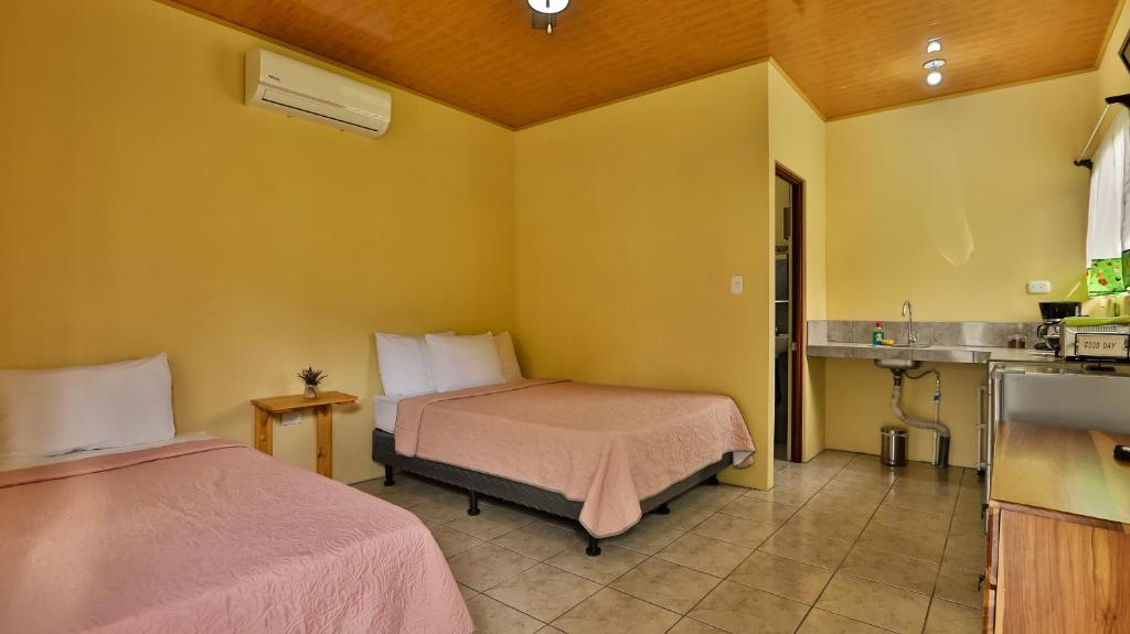 Postel nebo postele na pokoji v ubytování Chongos Place