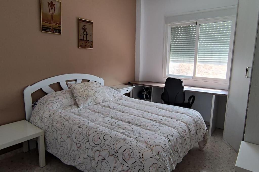 Łóżko lub łóżka w pokoju w obiekcie Casa Gazules