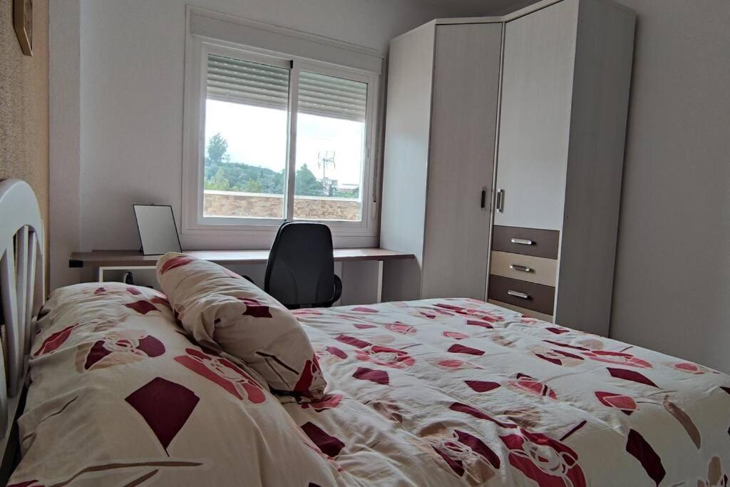 Łóżko lub łóżka w pokoju w obiekcie Casa Gazules