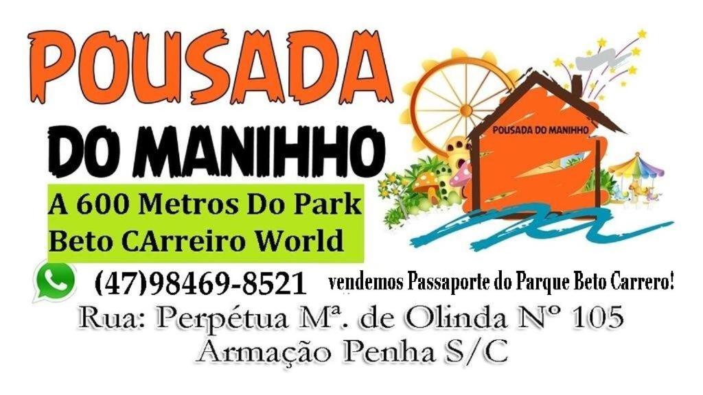 een poster voor een pommadilla do marinho evenement met een huis bij Pousada do Maninho in Penha