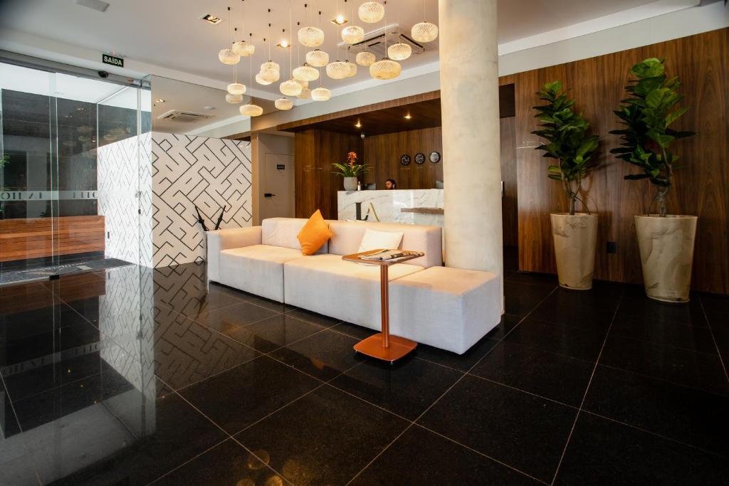 Postel nebo postele na pokoji v ubytování LA HOTEL VOTUPORANGA