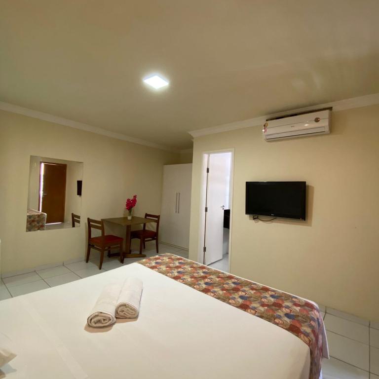 TV a/nebo společenská místnost v ubytování Hotel Monte Rei