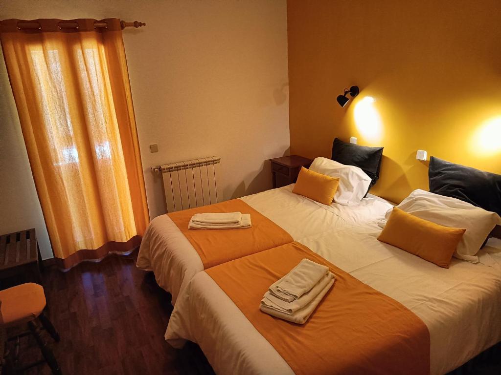 Postel nebo postele na pokoji v ubytování Quinta de Leandres