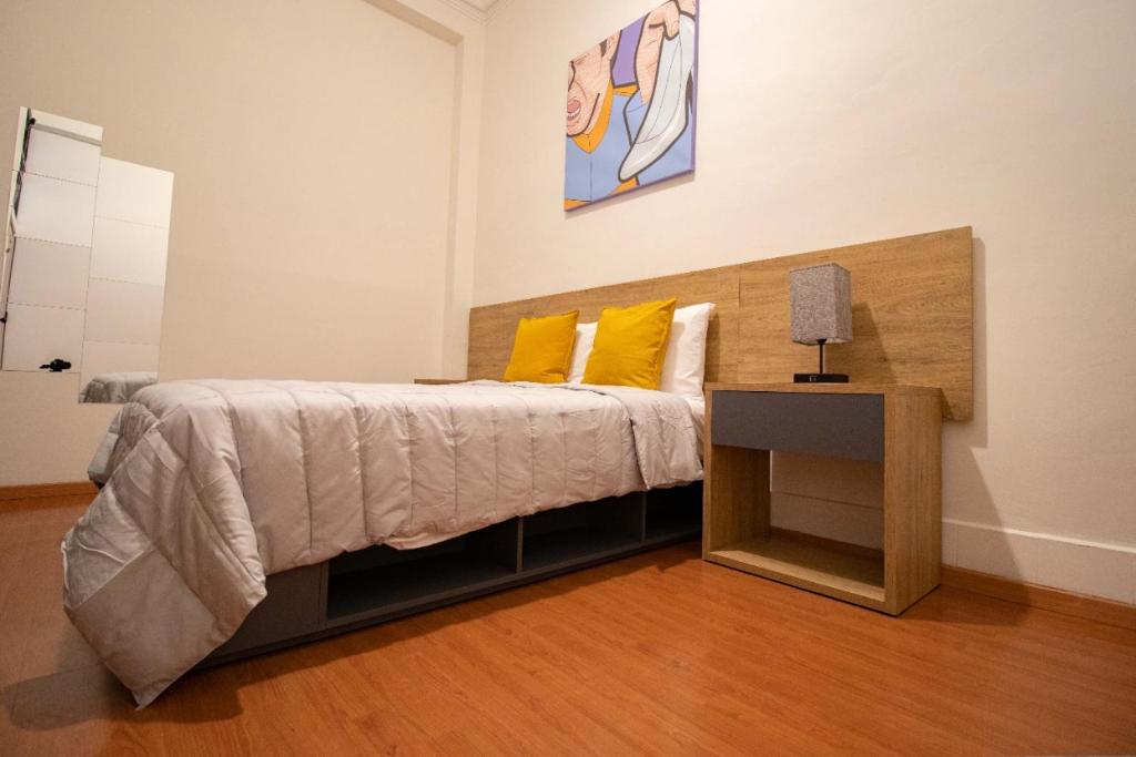 Postel nebo postele na pokoji v ubytování Hostal 170