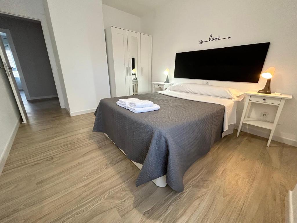 Posteľ alebo postele v izbe v ubytovaní Apartamento Gloria 1 Parking privado gratis