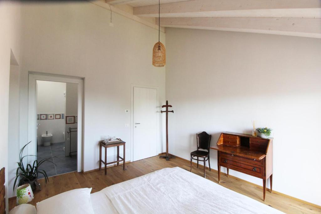 Posteľ alebo postele v izbe v ubytovaní Il Fienile di Sordevolo B&B