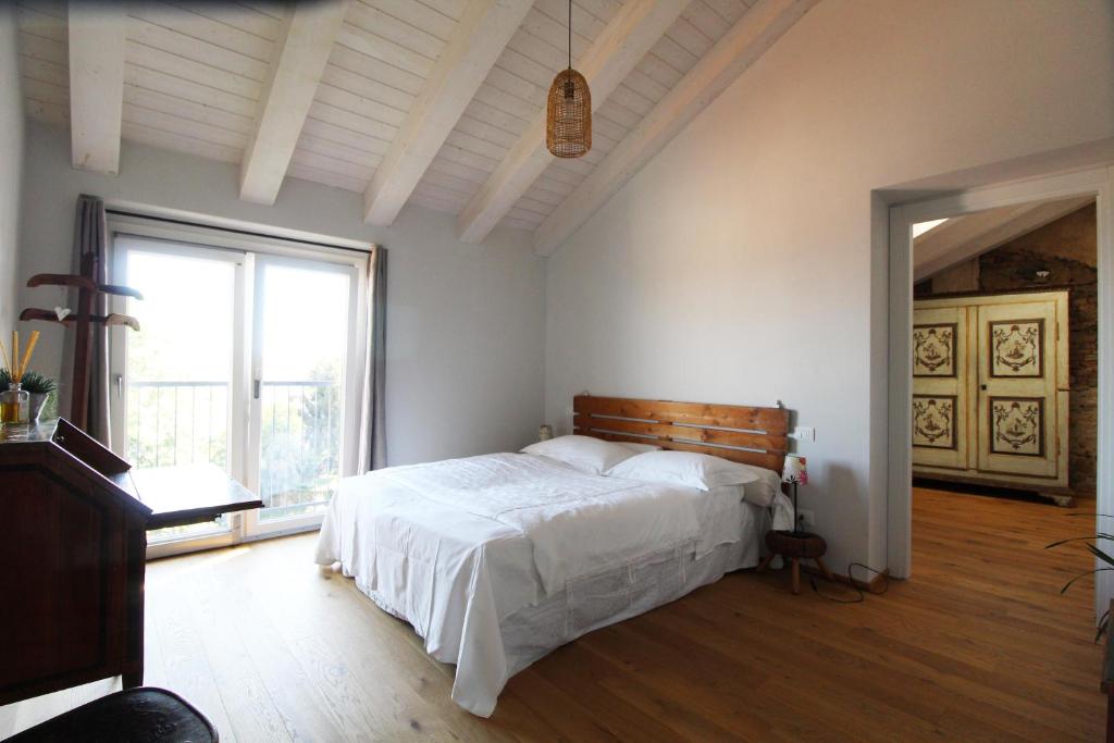 Posteľ alebo postele v izbe v ubytovaní Il Fienile di Sordevolo B&B