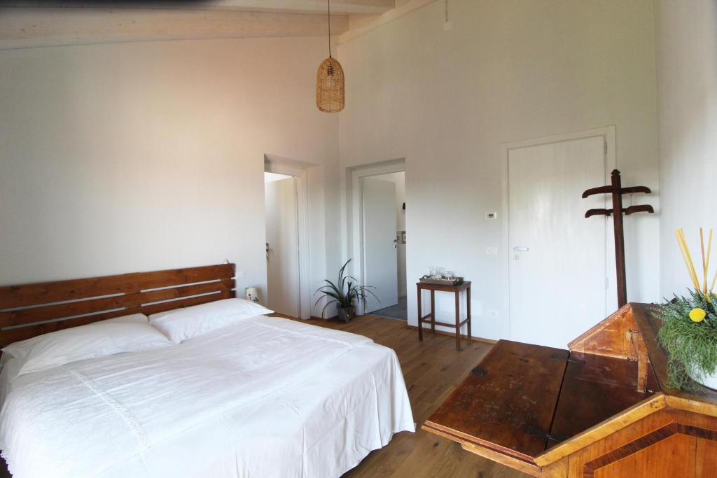 Posteľ alebo postele v izbe v ubytovaní Il Fienile di Sordevolo B&B