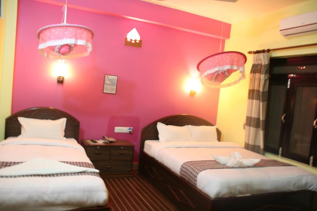 Postel nebo postele na pokoji v ubytování Sweet Home
