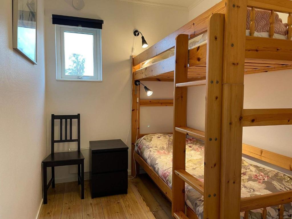 Postel nebo postele na pokoji v ubytování Holiday home LÖTTORP XIII