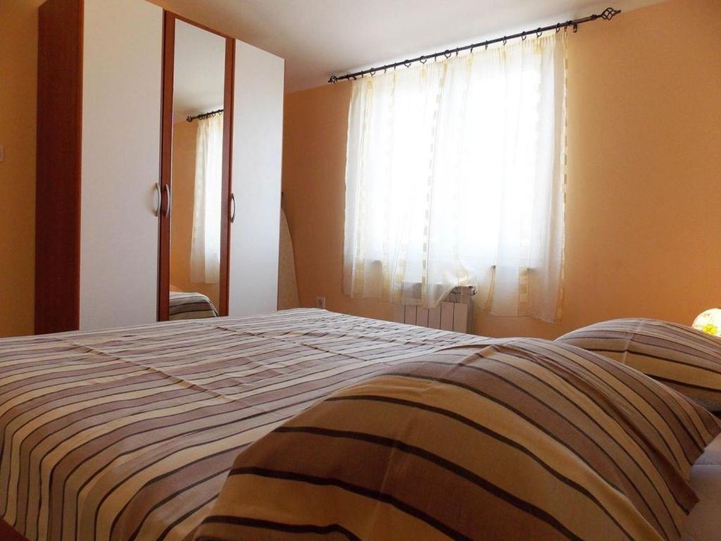 Posteľ alebo postele v izbe v ubytovaní House Buneta