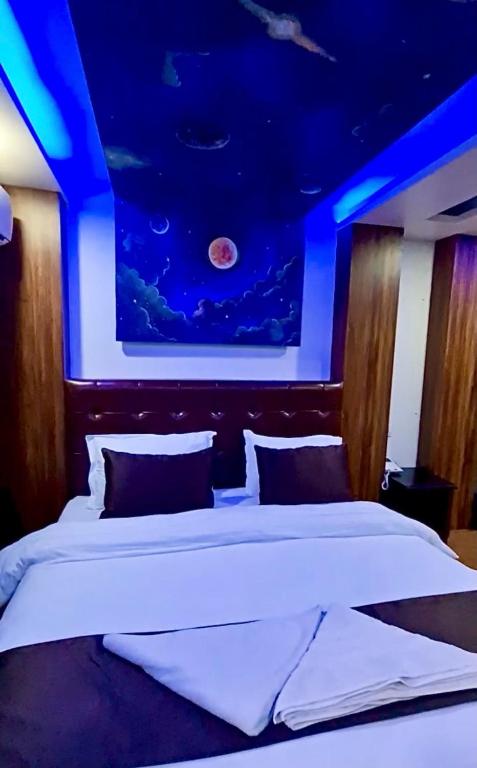 Postel nebo postele na pokoji v ubytování Dream Palace Resort