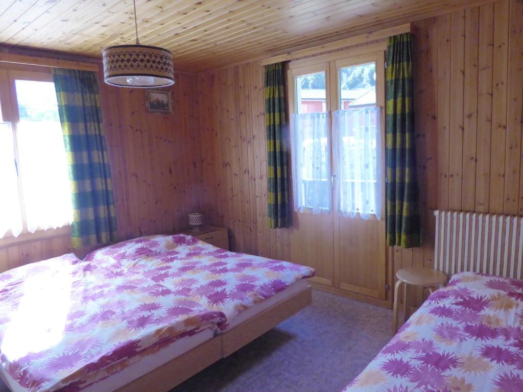 Letto o letti in una camera di Zimmervermietung Ackersand