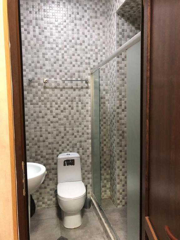 Koupelna v ubytování Hotel Guri