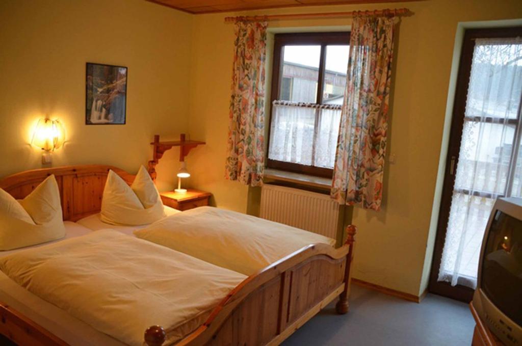 Postel nebo postele na pokoji v ubytování Kollerhof