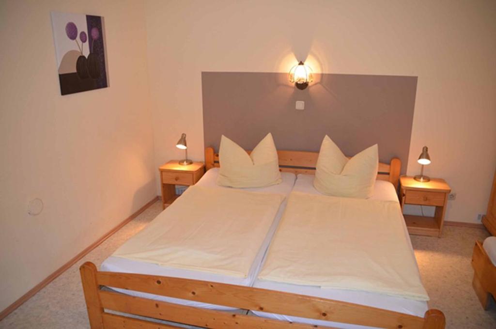 Postel nebo postele na pokoji v ubytování Kollerhof