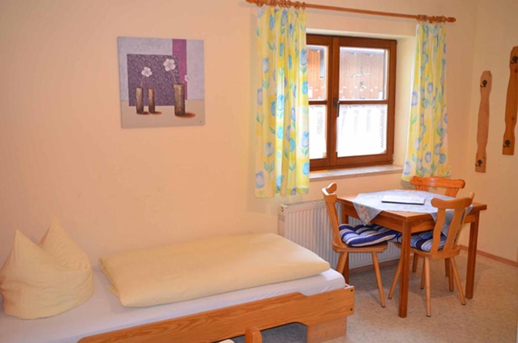 Postel nebo postele na pokoji v ubytování Kollerhof