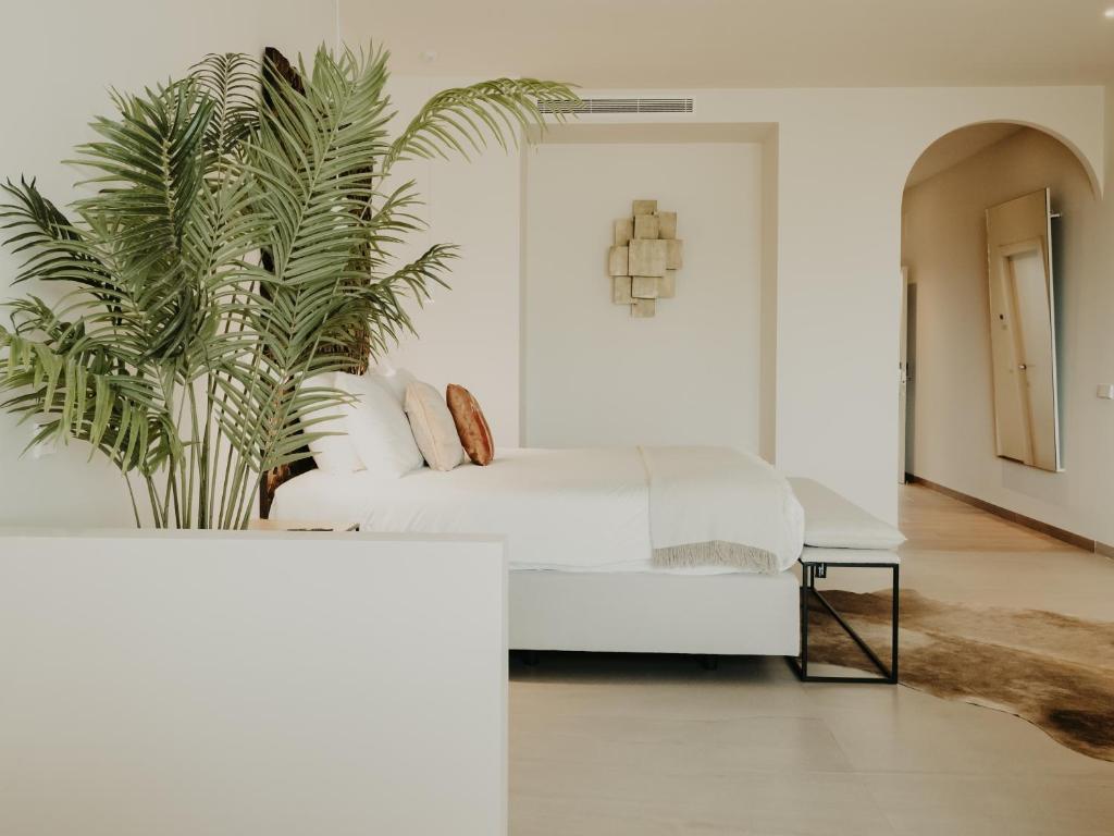 Posteľ alebo postele v izbe v ubytovaní Comfy Studios Hotel