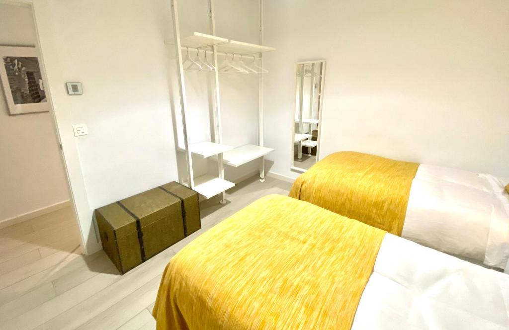 A bed or beds in a room at CARRERA HOME