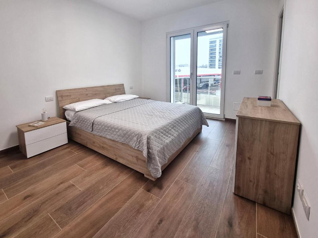 Кровать или кровати в номере SUITE GENTILE