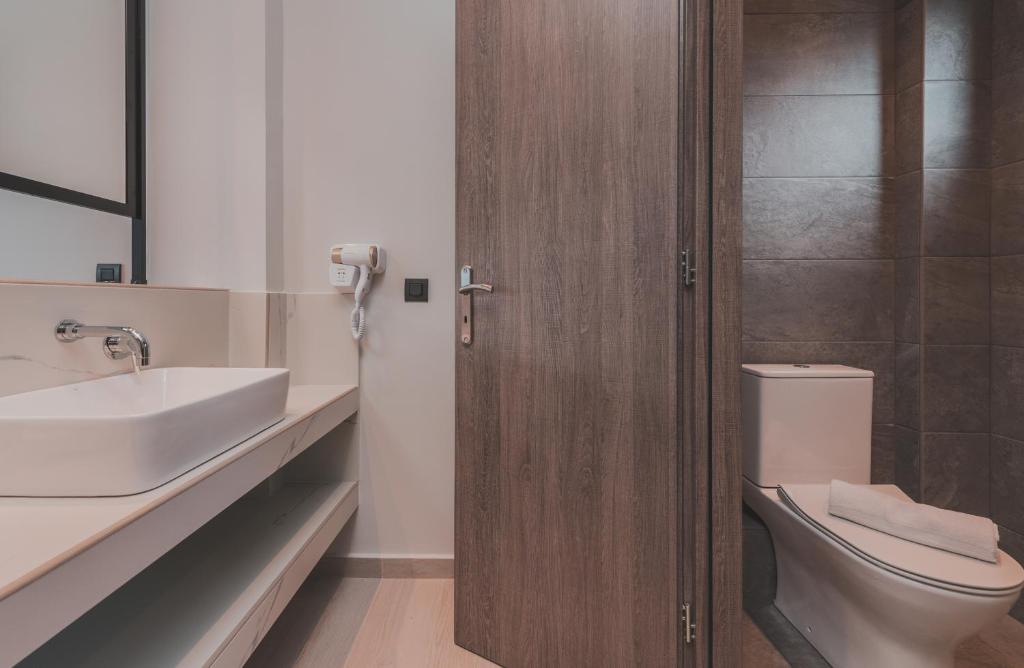 Koupelna v ubytování Cavo di Suites